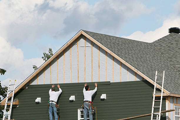 Professional Siding Contractor technician working in Devon, PA